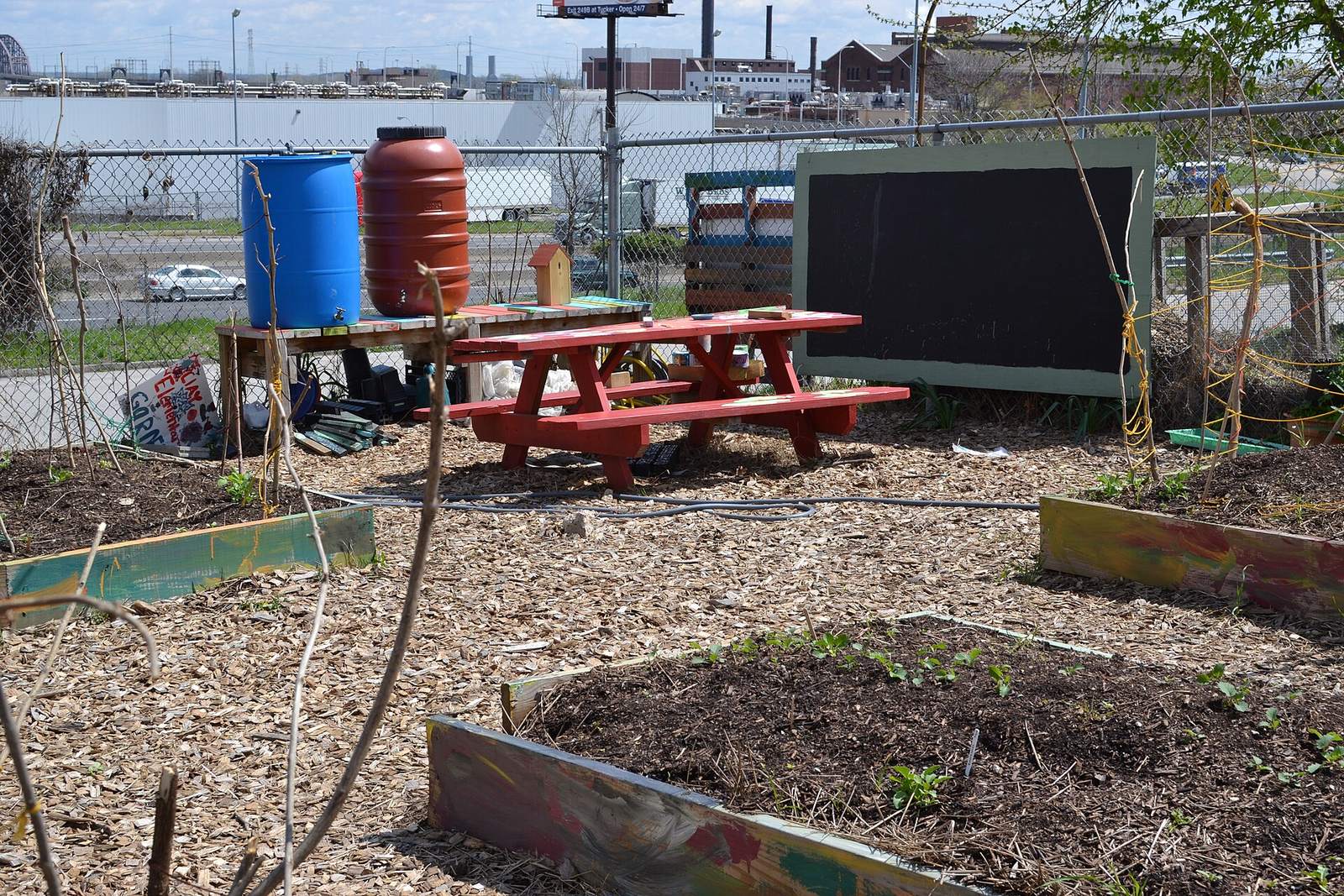 Clay Elementary School Garden: raised beds, picnic table, rain barrels and chalkboard