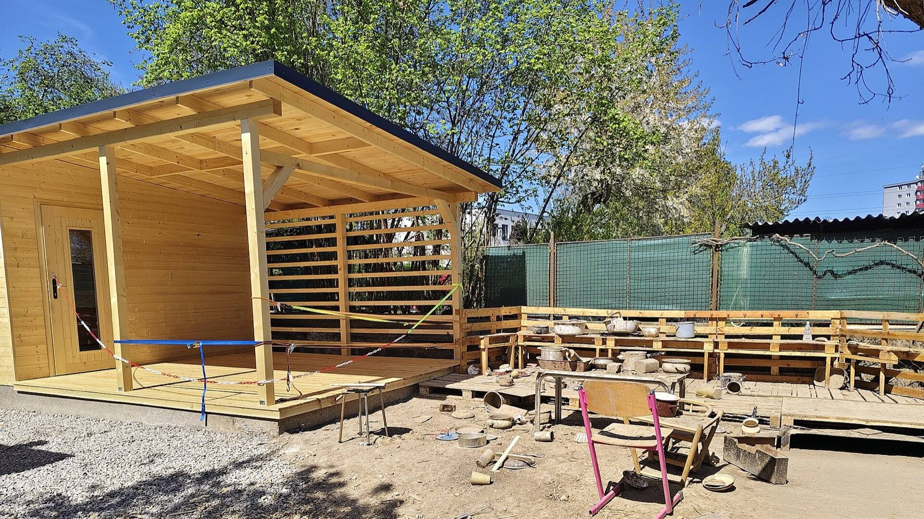 Vypich Adventure Playground, Prague: mud kitchen with pallet counters and pots