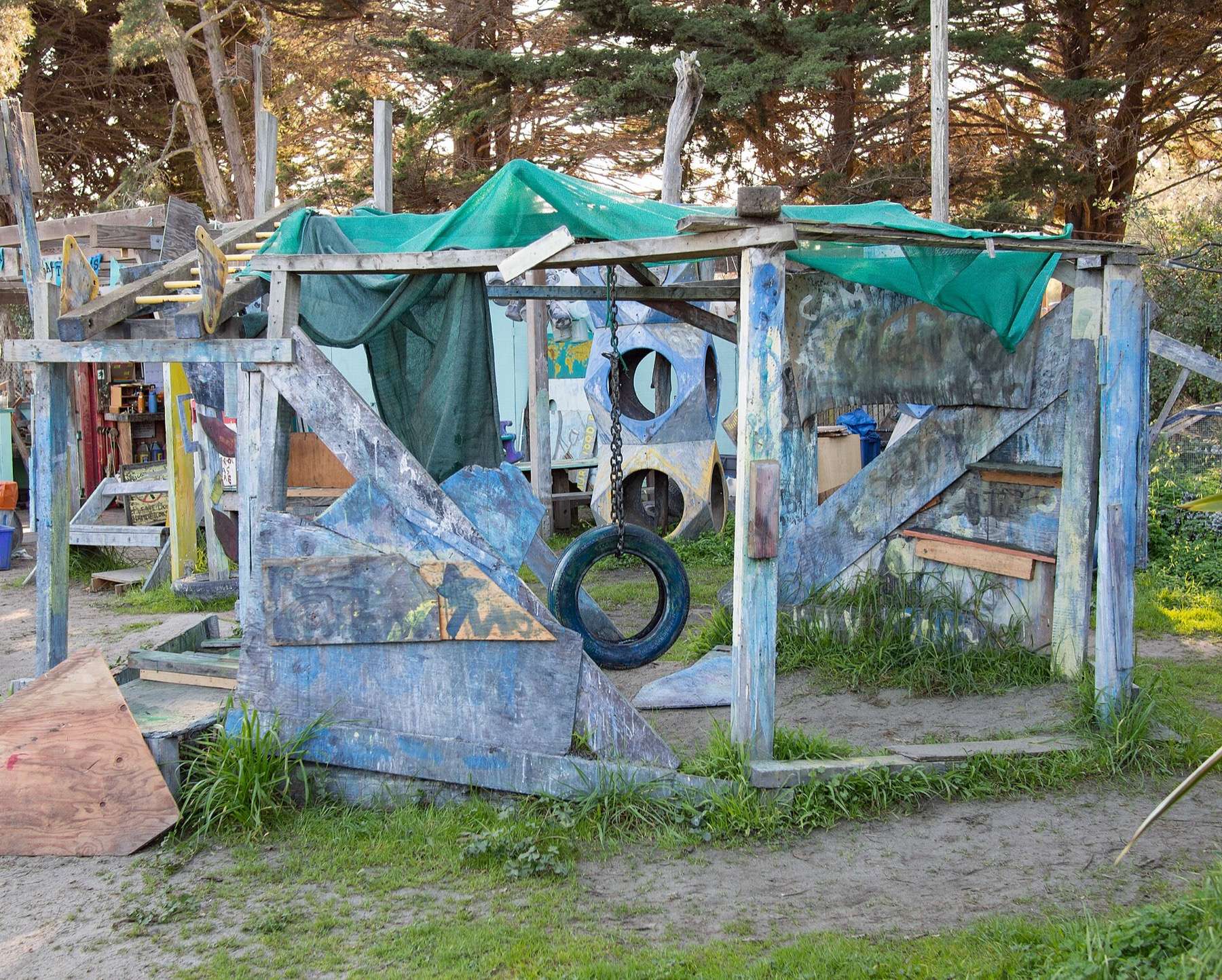 Adventure Playground, Berkeley: tarp-roofed shelter with tire swing