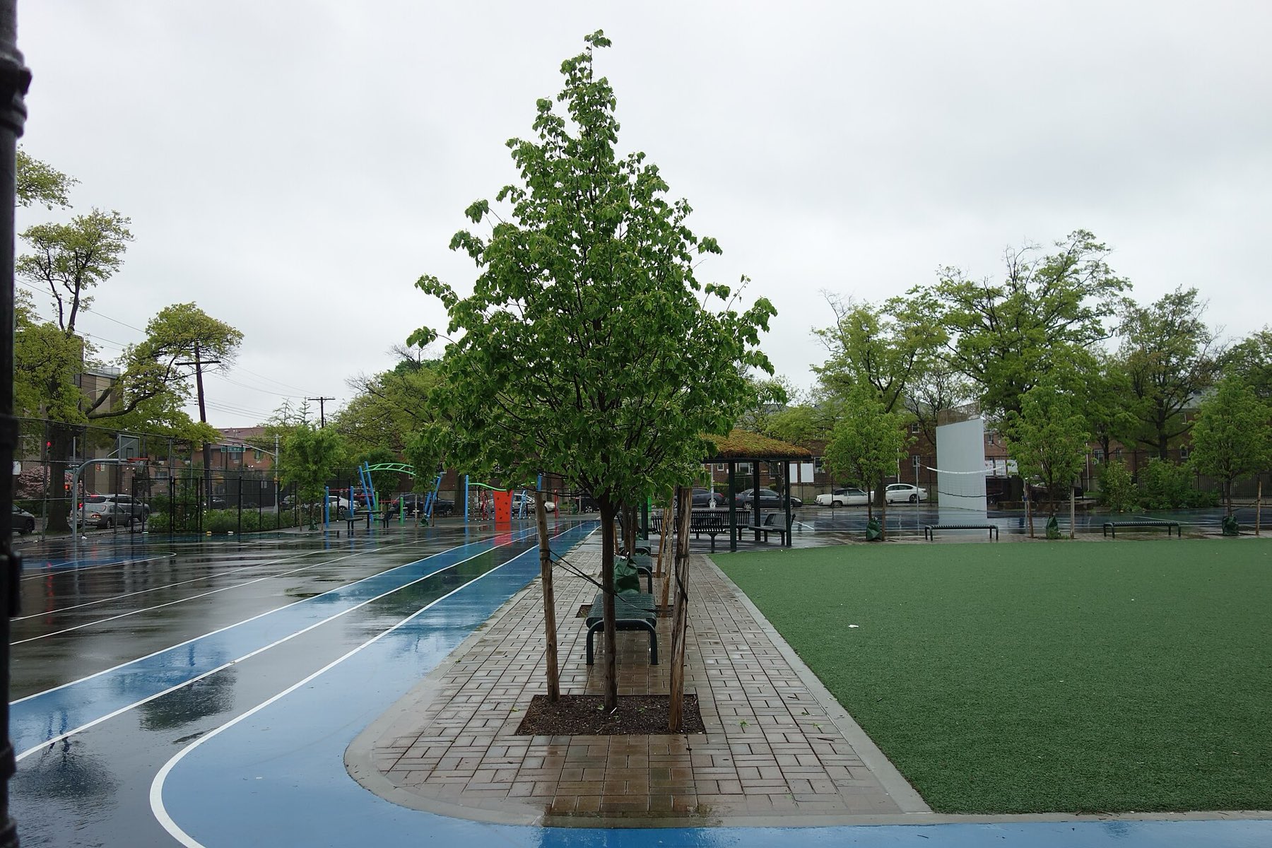 I.S. 250 Community Playground, track, lawn and trees