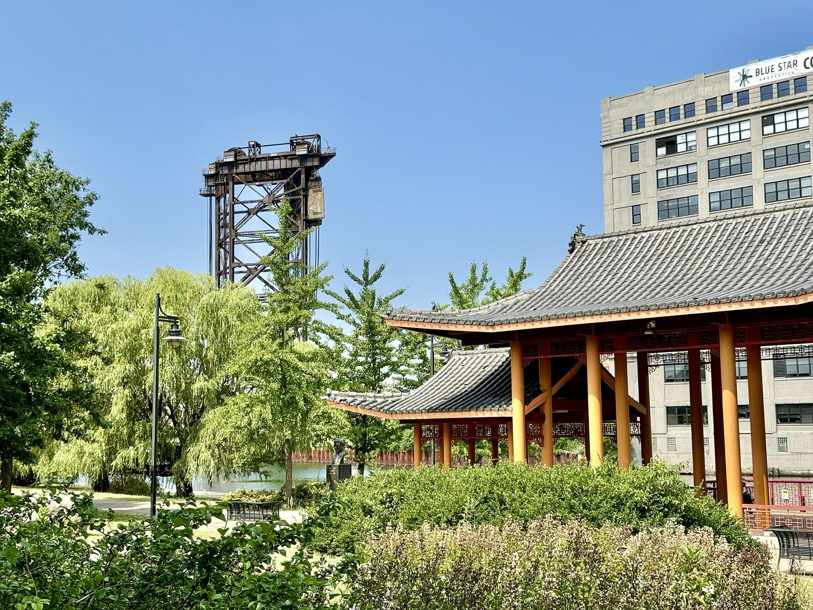 Ping Tom Memorial Park: Timber pavilion with shrub borders and trees